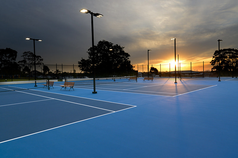 QSQ B Series Club Tennis Court Lighting of multiple courts at sunset
